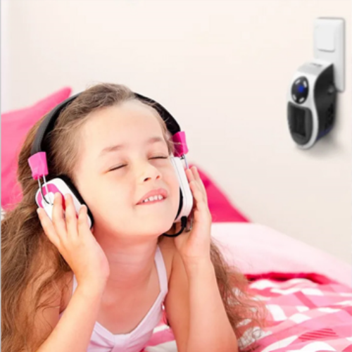 little girl listening to music while staying warm with Toasty Heater